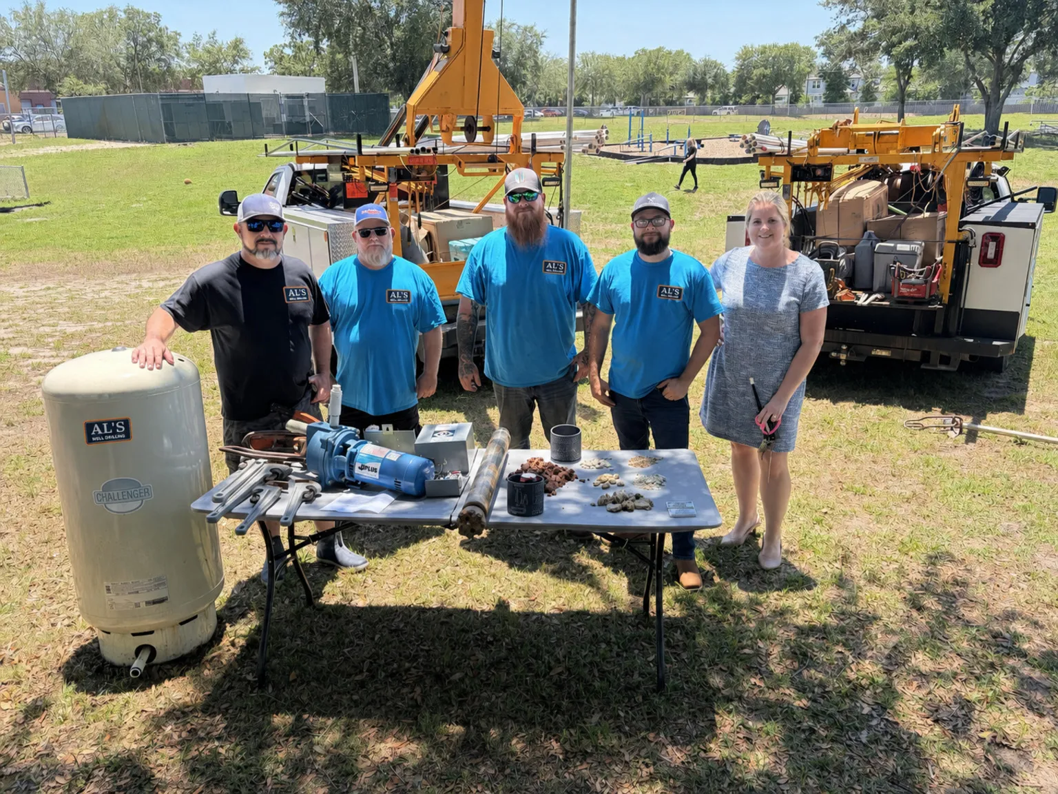 AL’s Well Drilling team with service equipment