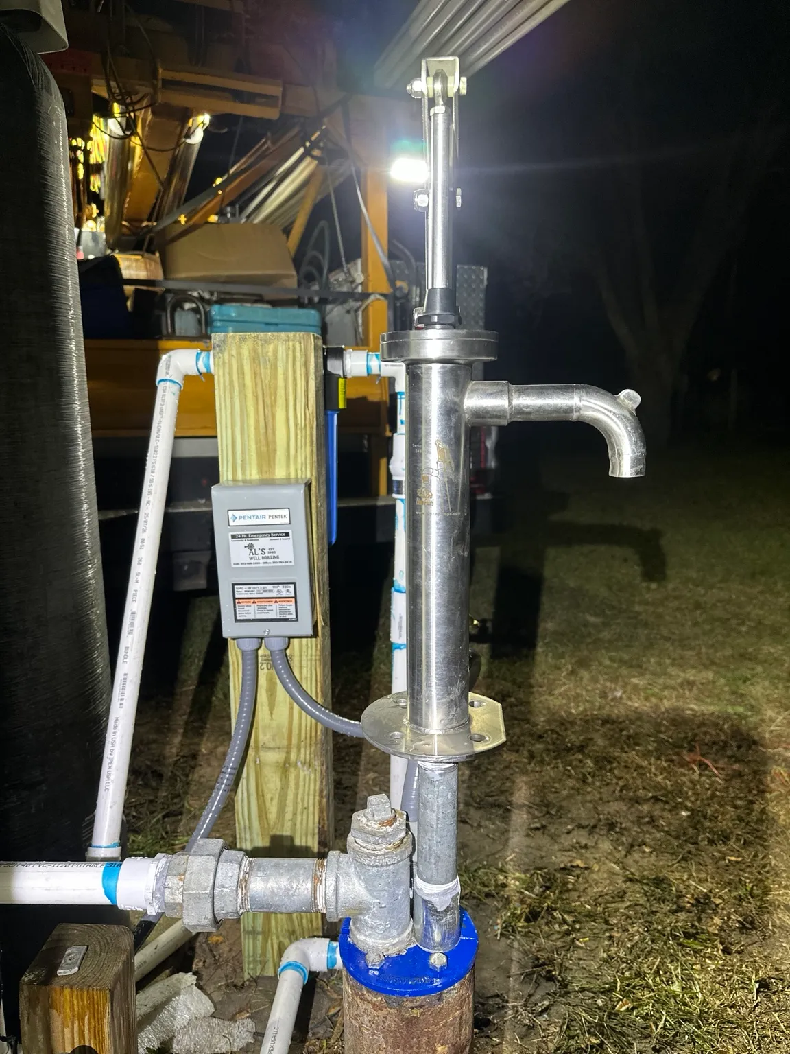 Installed stainless-steel deep-well hand pump